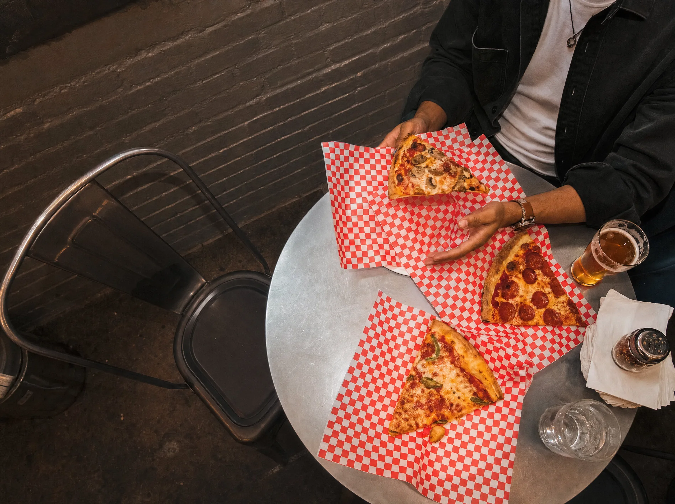 Friends sharing food and drinks at a local spot
